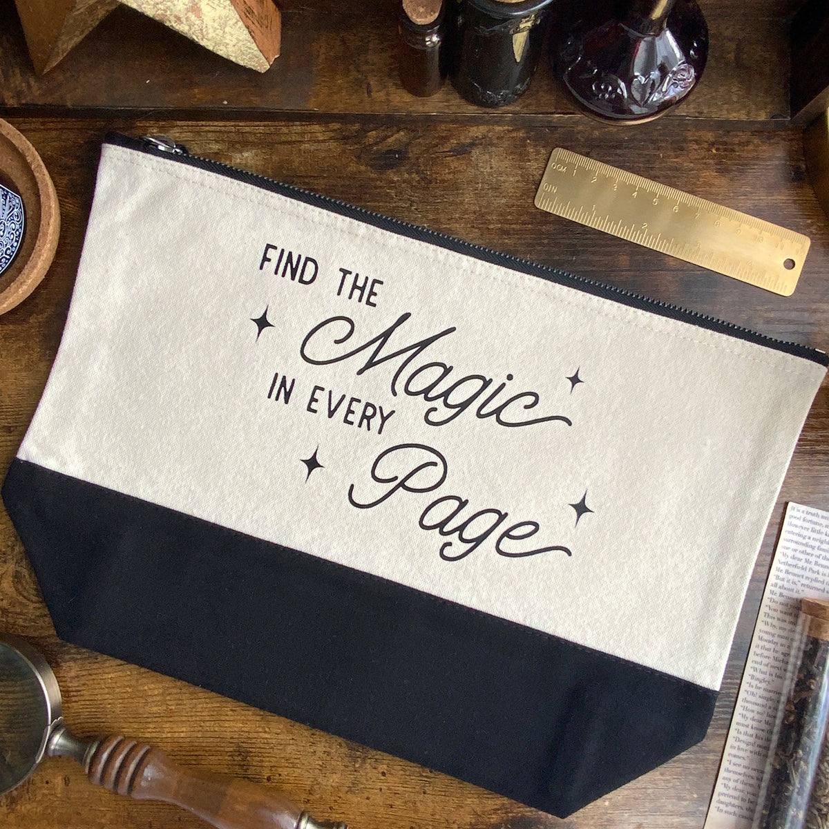 "Find the Magic in Every Page" Dipped Black and Natural Fabric Pouch