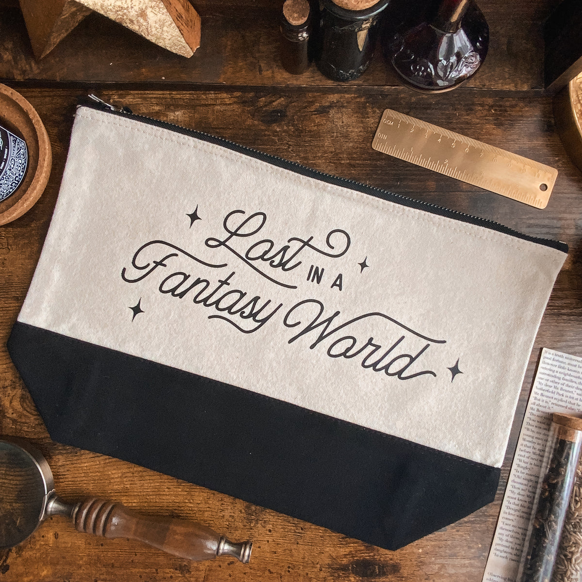 "Lost in a Fantasy World" Dipped Black and Natural Fabric Pouch