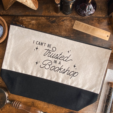 "I Can't Be Trusted in a Bookshop" Dipped Black and Natural Fabric Pouch